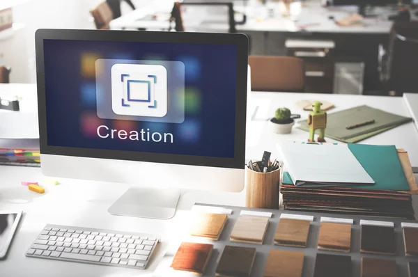 Computer monitor on workplace table — Stock Photo, Image