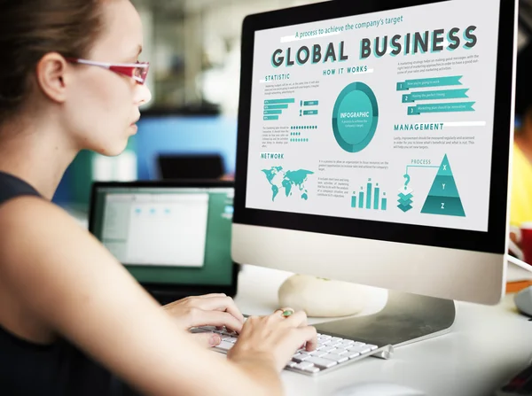 Businesswoman working on computer with Global Business — Stock Photo, Image