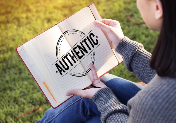 Woman with paper notebook in hands — Stock Photo, Image