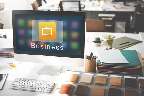 Computer monitor on workplace table — Stock Photo, Image