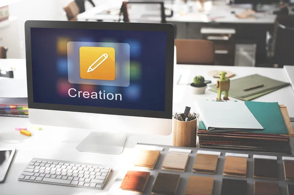 Computer monitor on workplace table — Stock Photo, Image