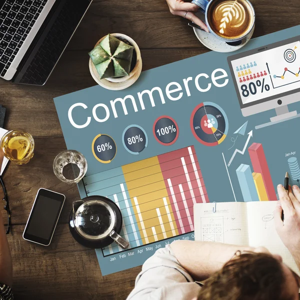 Table with poster with Commerce — Stock Photo, Image