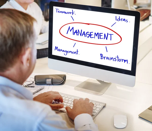 Mature businessman working on computer — Stock Photo, Image