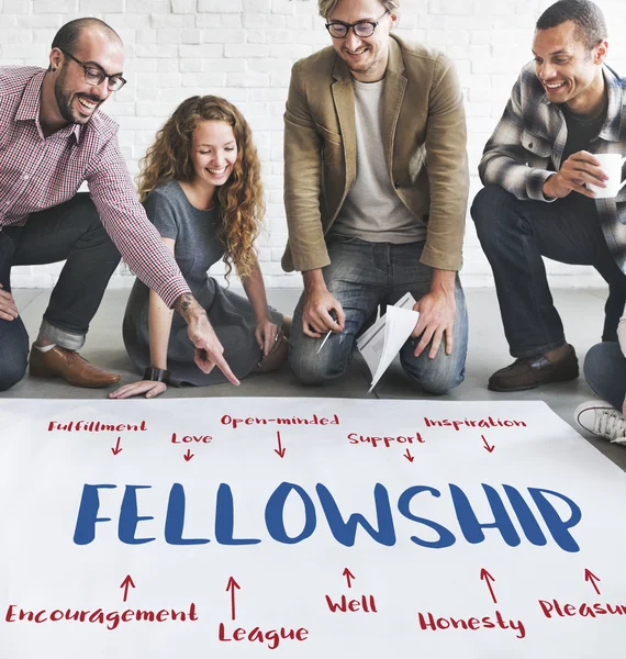 Designers working with poster and Fellowship — Stock Photo, Image