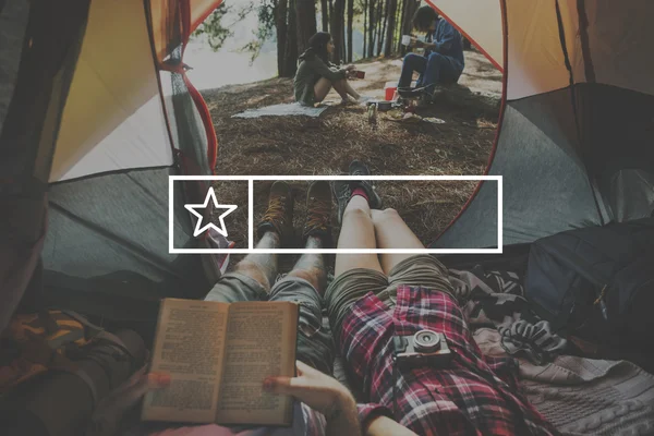 Friends relaxing in tent — Stock Photo, Image