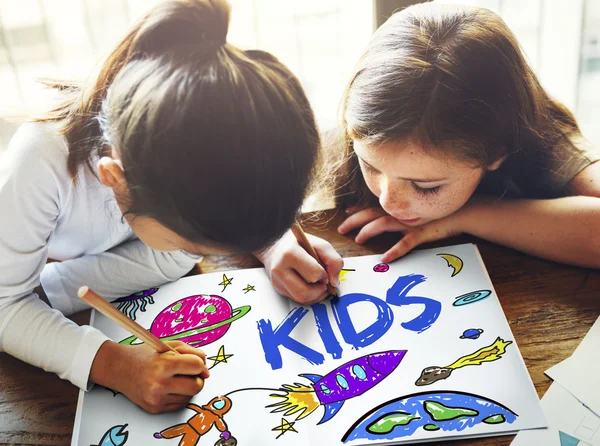 Girls Drawing in coloring-book — Stock Photo, Image