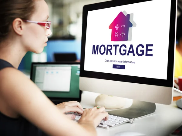 Businesswoman working on computer with Mortgage — Stock Photo, Image