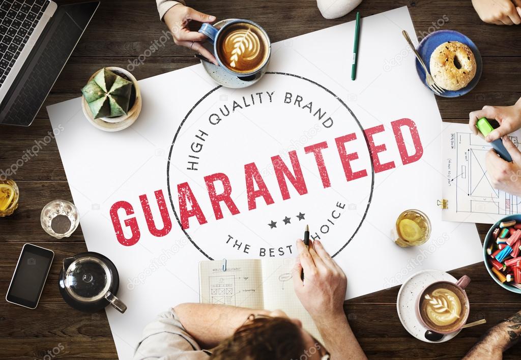 table with poster with Guaranteed
