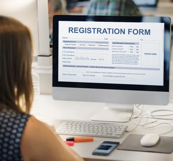 Woman using computer with graphic text — Stock Photo, Image