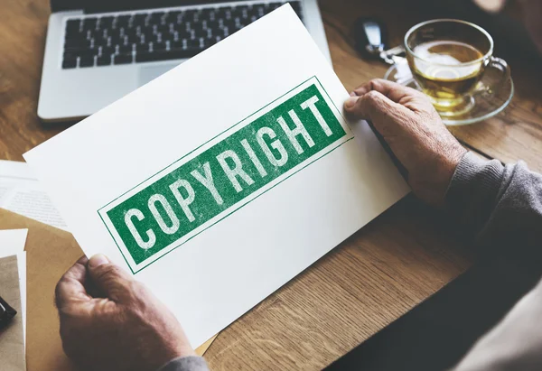 Stück Papier mit Urheberrecht — Stockfoto