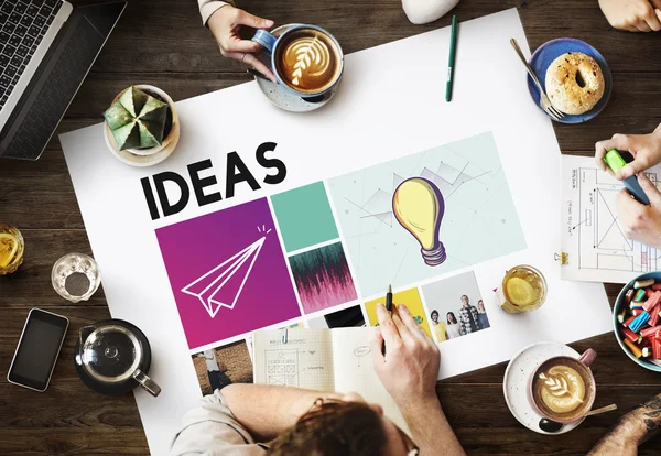 Table with poster with Ideas — Stock Photo, Image