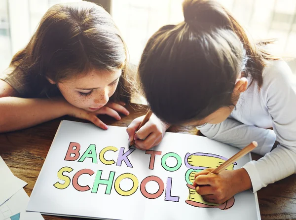 Girls Drawing in coloring-book — Stock Photo, Image