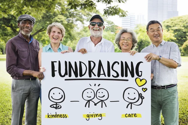 Senior Friends holding board — Stock Photo, Image