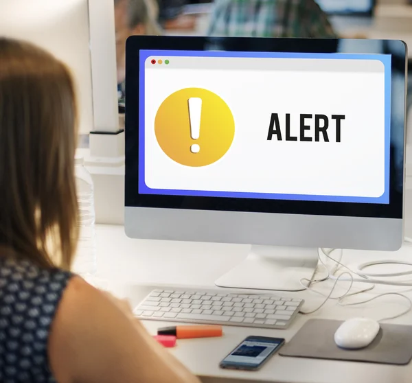 Woman using computer at workplace table — Stock Photo, Image