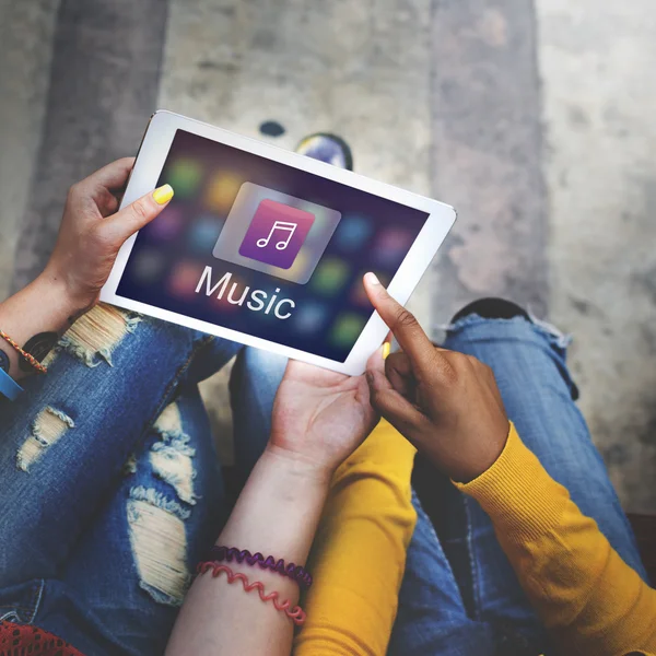 Girls students using digital tablet — Stock Photo, Image