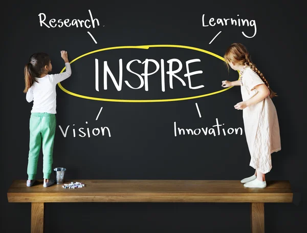 Girls drawing on Blackboard — Stock Photo, Image