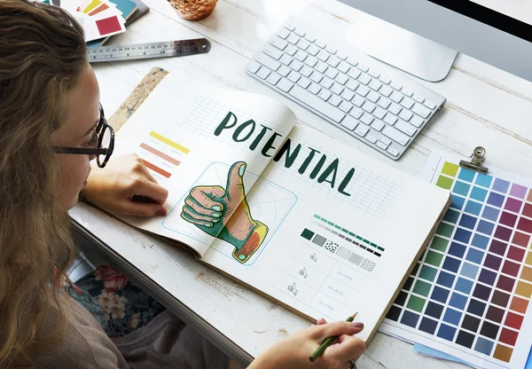 Woman with sketch-book in office — Stock Photo, Image