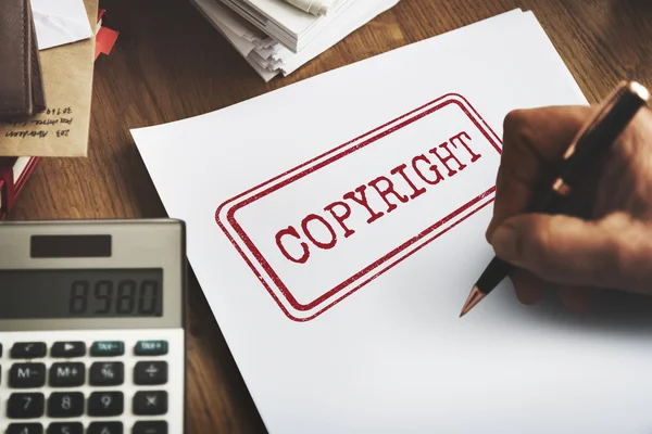 Stück Papier mit Urheberrecht — Stockfoto