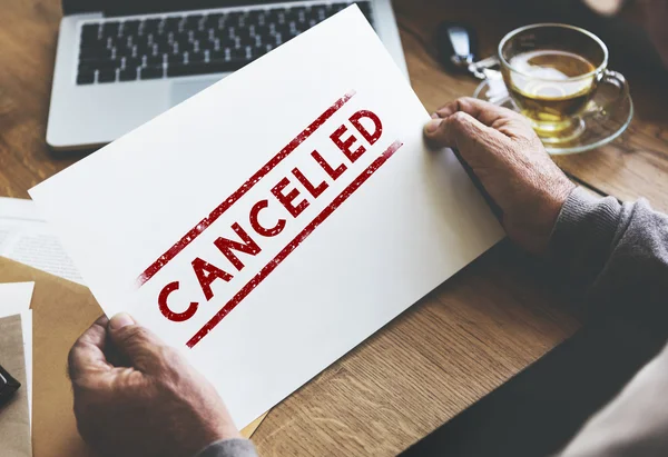 Piece of paper with Cancelled — Stock Photo, Image