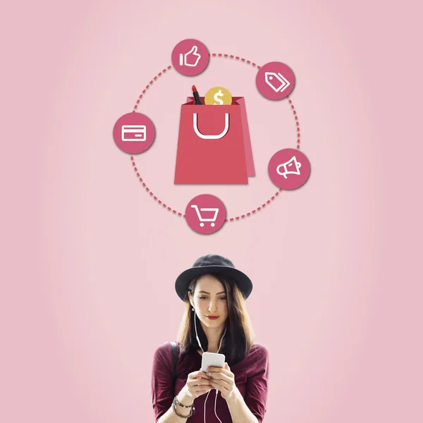 Woman in hat browsing Smart phone — Stock Photo, Image