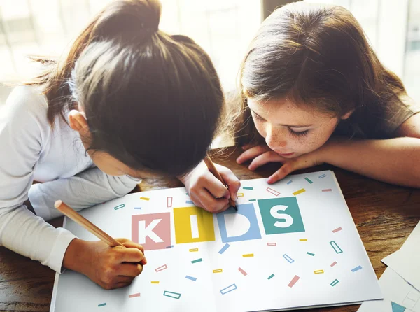 Girls Drawing in coloring-book — Stock Photo, Image