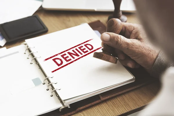 Stempel in notitieboekje met geweigerd — Stockfoto