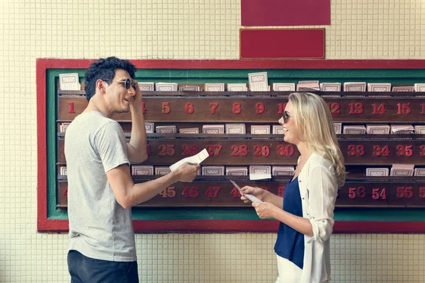 Couple in buddhist temple talking — Stock Photo, Image