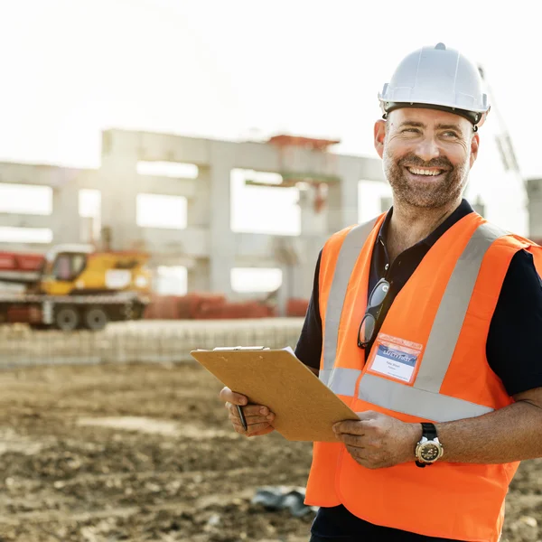 Obrero de la construcción con arquitectura Plan —  Fotos de Stock