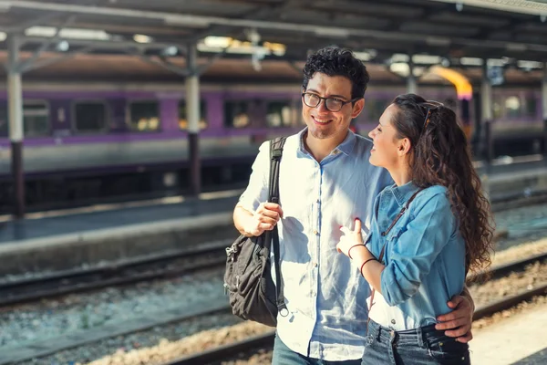 Lovely couple traveling by train — Stock Photo, Image