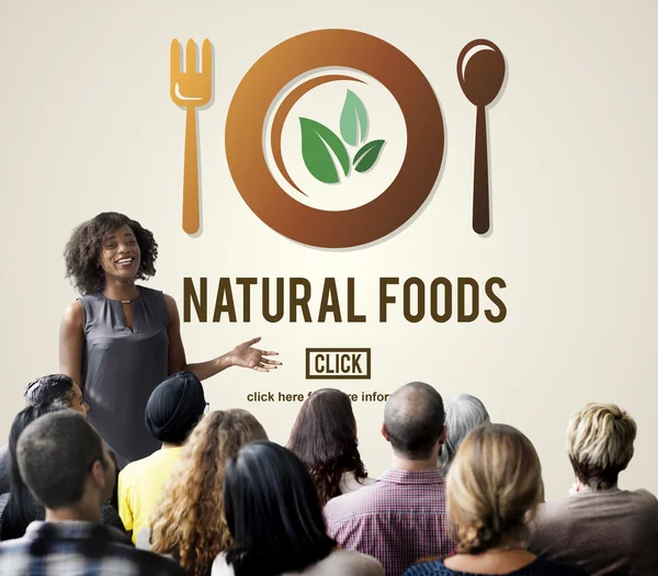 People at seminar with Natural Foods — Stock Photo, Image