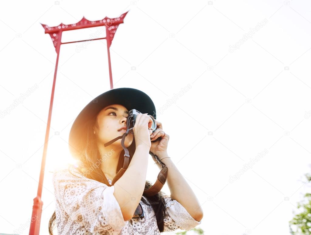 young Asian Girl with camera