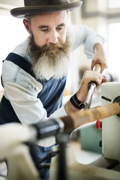 Craftsman working in workshop — Stock Photo, Image