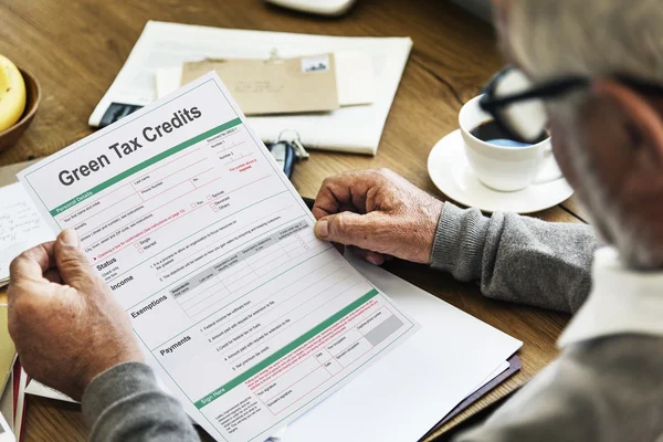 Piece of paper with Green Tax Credits — Stock Photo, Image