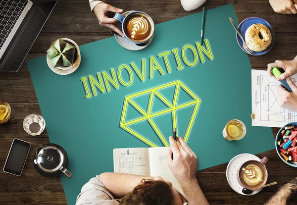 Table with poster with Innovation — Stock Photo, Image