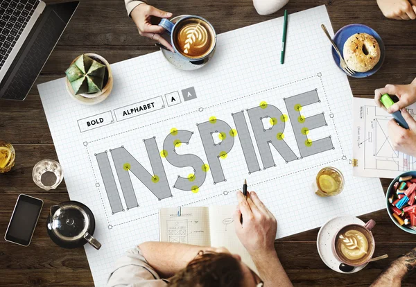 Mesa con póster con Inspire —  Fotos de Stock