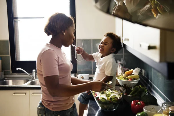 Kid Feeding Mom Kitchen — Stock Photo, Image