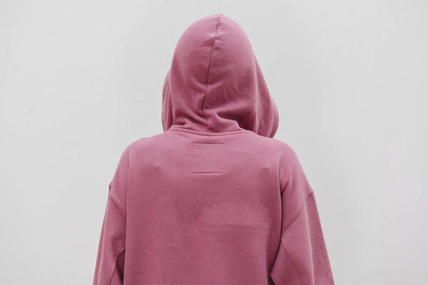 Cool girl wearing a pink hoodie