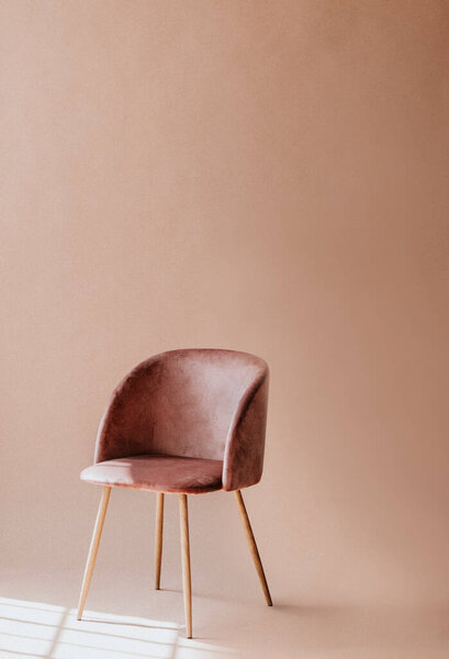 isolated chair in an empty room
