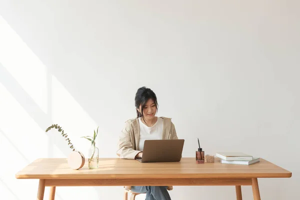 Happy Asian Woman Working Home Stock Photo