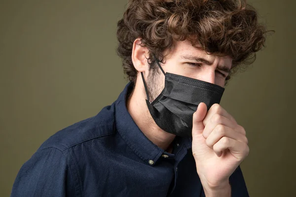 Young Caucasian Man Wearing Black Face Mask Coughing — Stock Photo, Image
