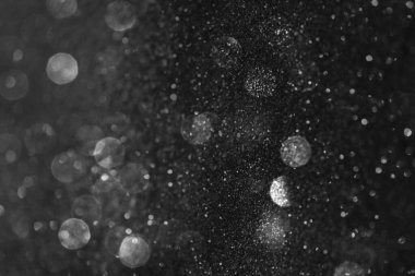 Siyah arkaplanda beyaz parıltı deseni