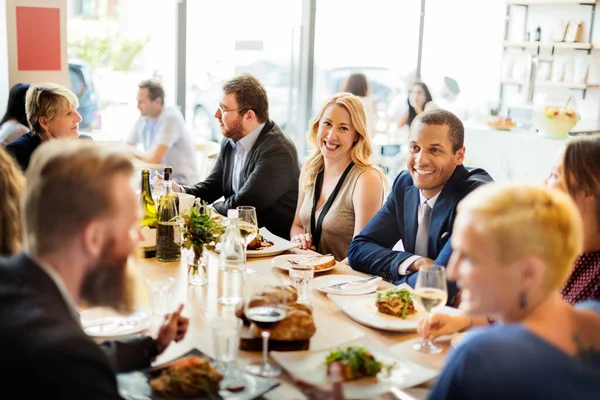 Group Diverse People Having Lunch Together Stock Photo