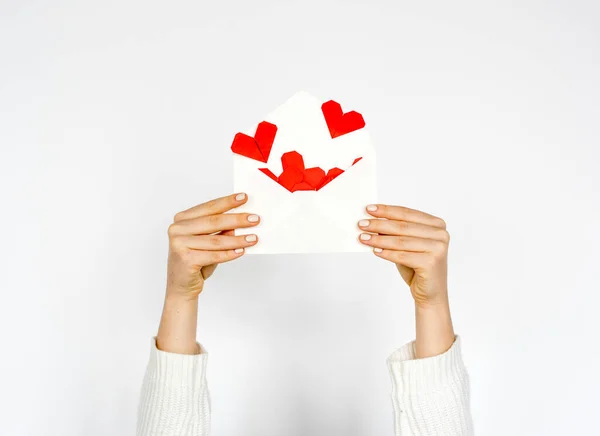 Hands Holding Envelope Hearts White Background — 图库照片