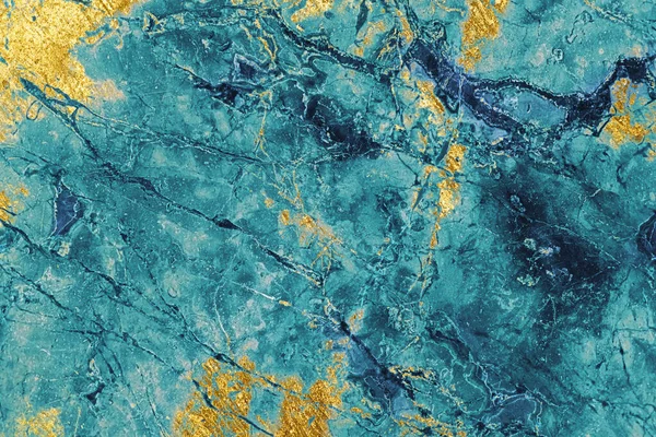Teal with golden patches on a marble texture
