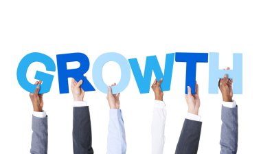 Hands Holding Word 'GROWTH'