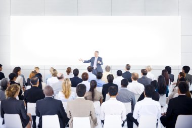 Large group of business people in presentation. clipart