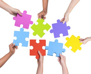 Human hands holding jigsaw puzzle clipart