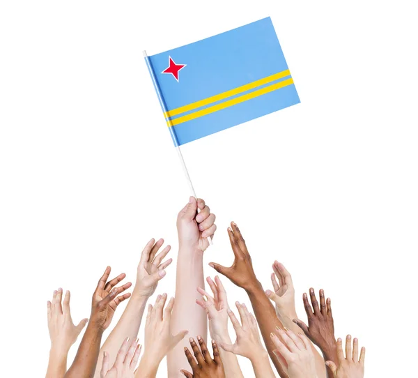 Arms Raised for Flag of Aruba — Stock Photo, Image