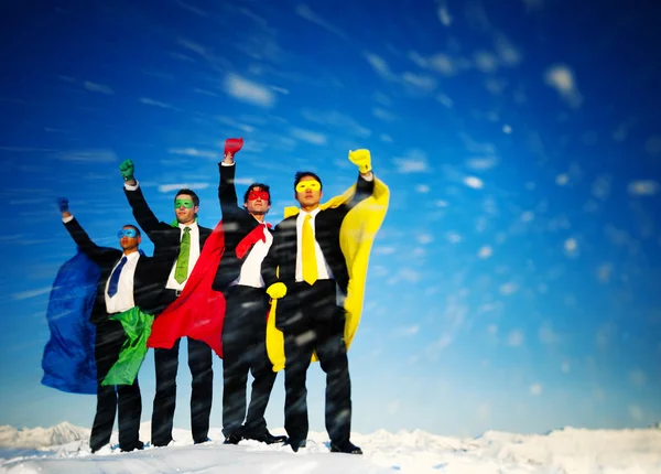 Business Superheros with arms raised — Stock Photo, Image