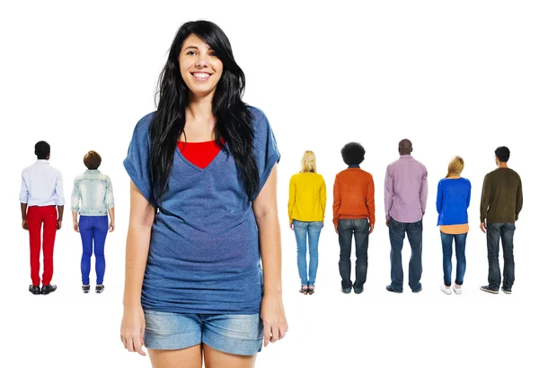 Back View of People and Woman at Front — Stock Photo, Image